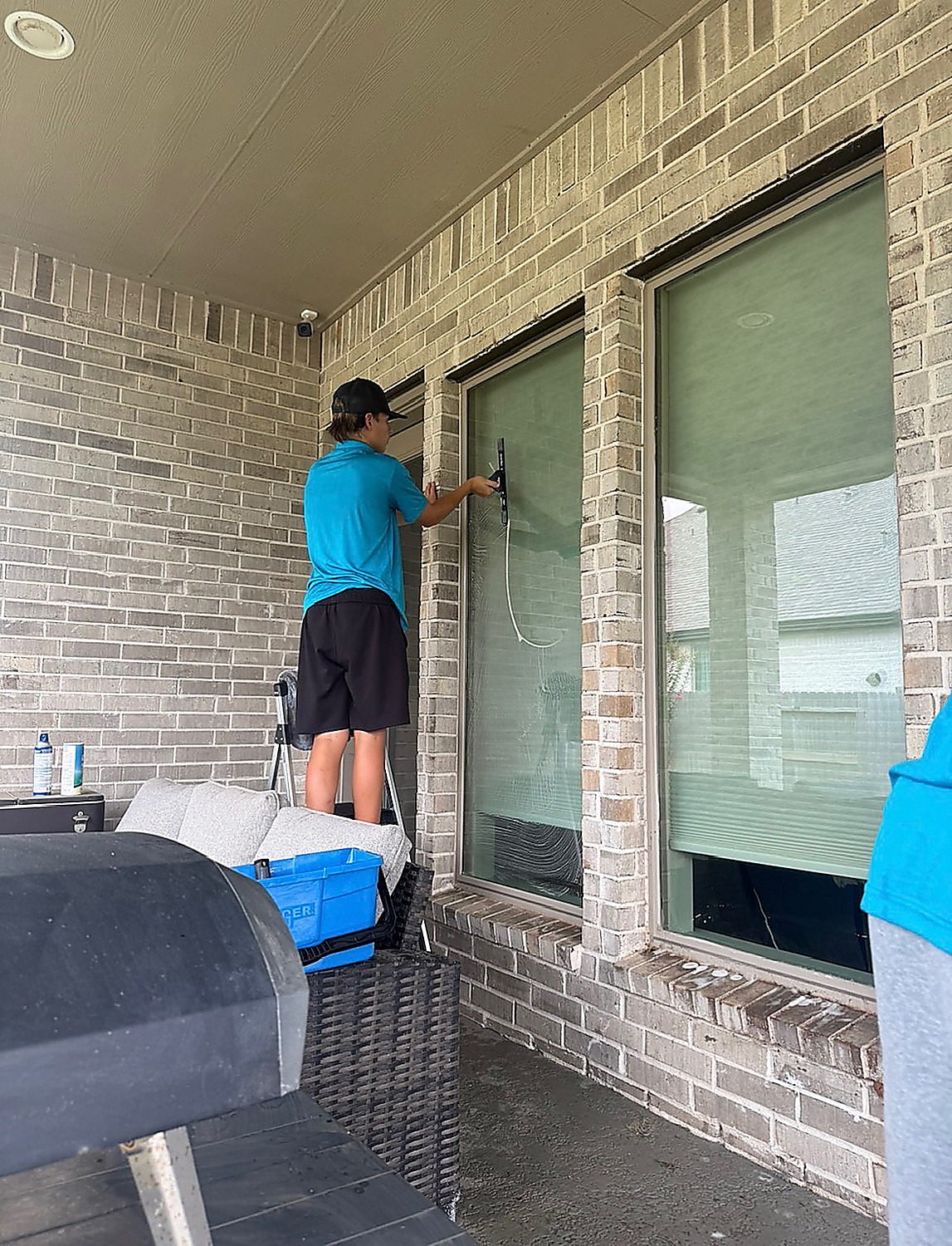 Exterior window cleaning technician