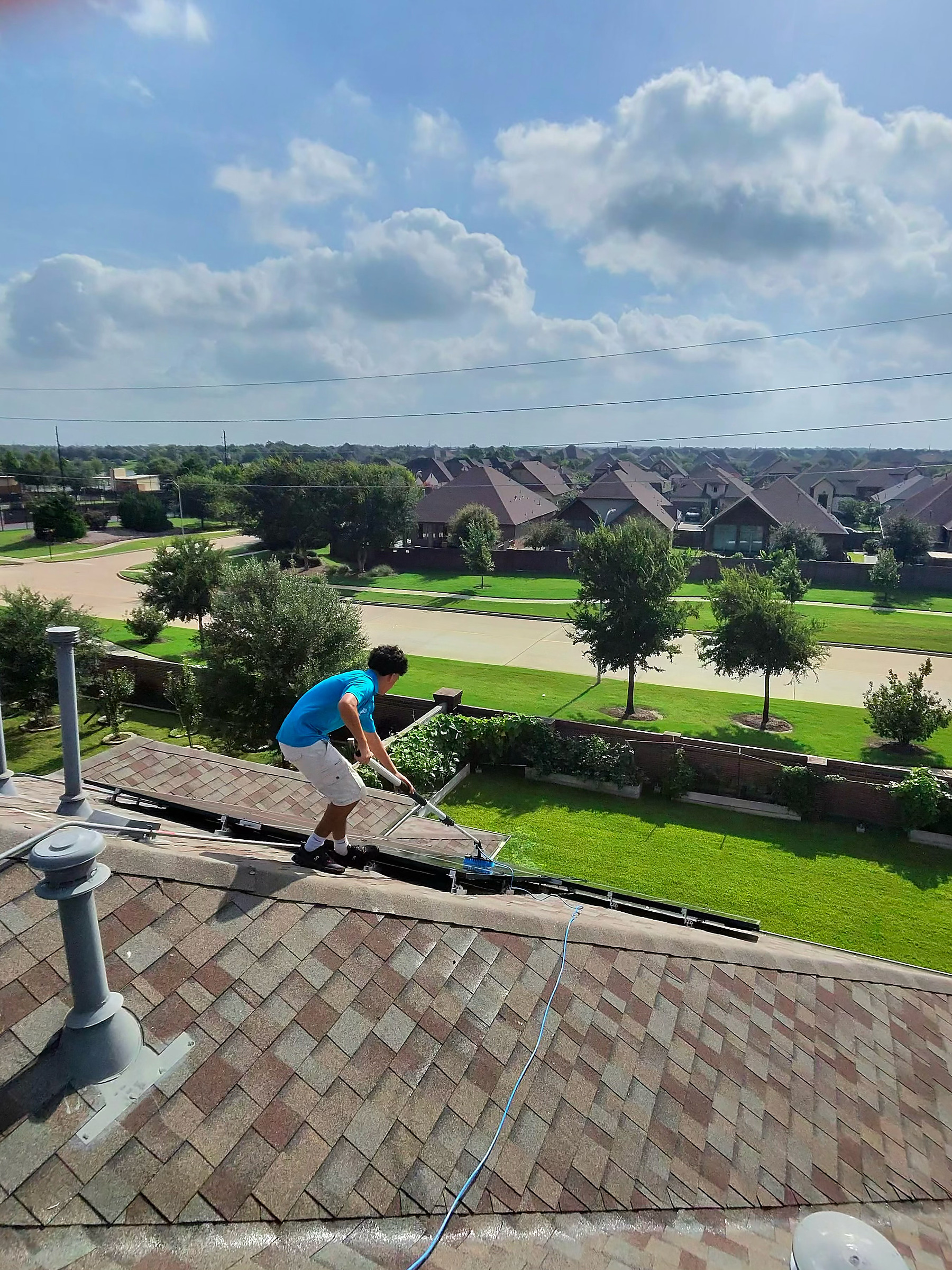 Solar panel cleaning action on a local roof